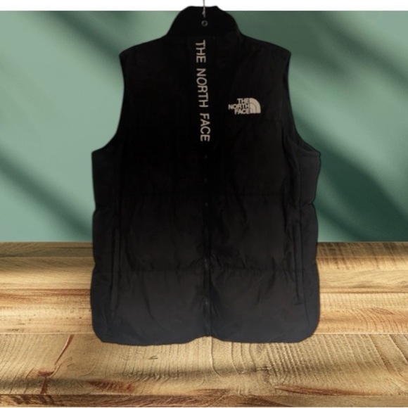 The North Face Black Insulated puffer Vest medium